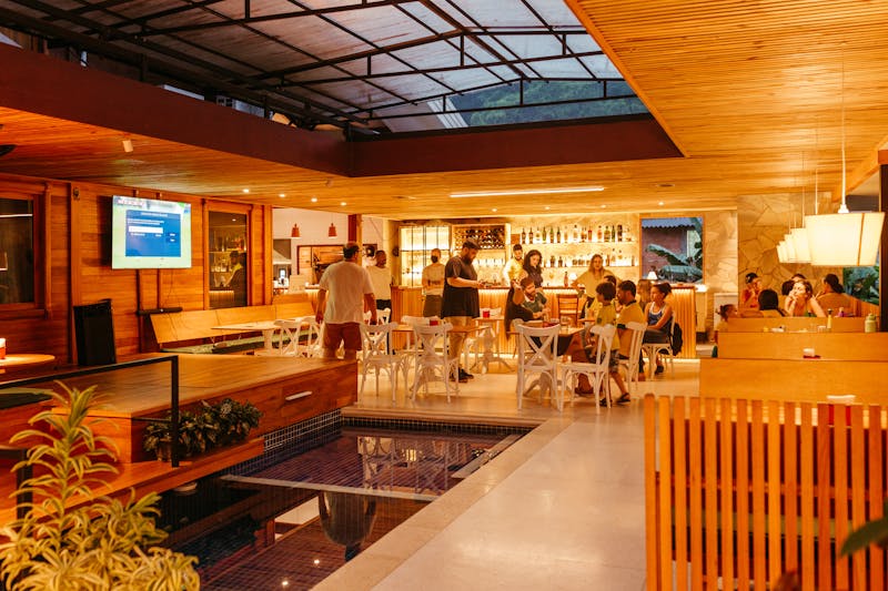 Dewey's Pizza restaurant interior with warm lighting and inviting atmosphere